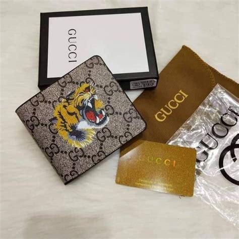 portafogli gucci tigre|gucci tiger clothing.